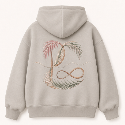 Model wearing the PinkyCoco Coastal Monogram Infinity oversized fleece hoodie
