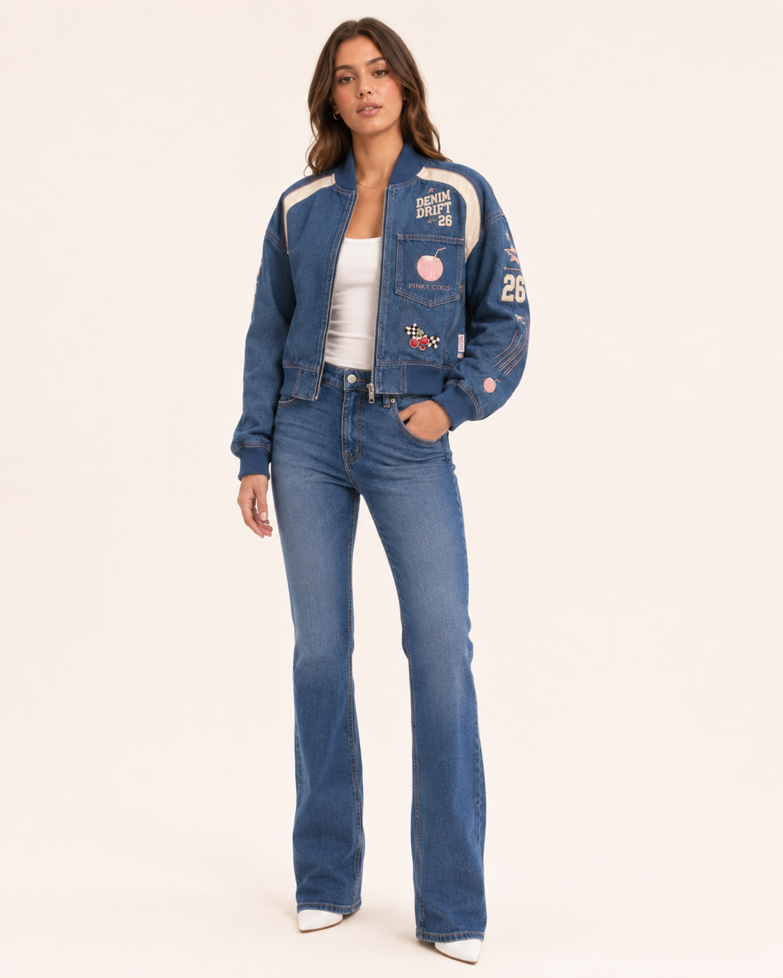 Model wearing the PinkyCoco Coco Drift women's racing jacket, front view