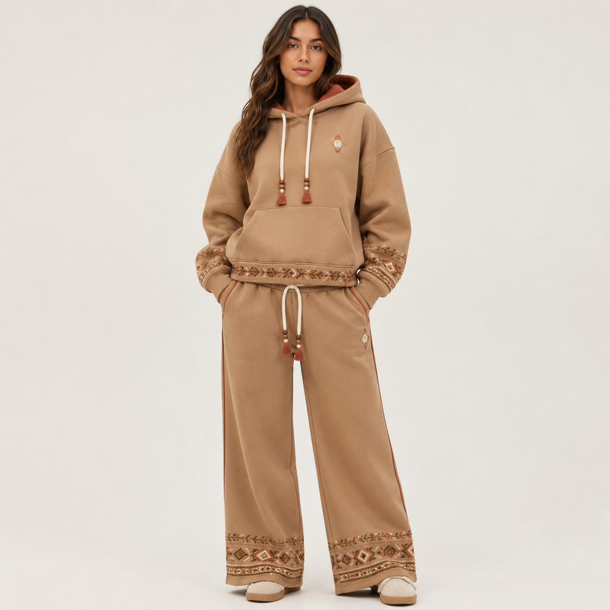 Model wearing the PinkyCoco Desert Coco Nomad fleece hoodie and sweatpants set, front view