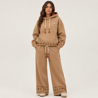 Model wearing the PinkyCoco Desert Coco Nomad fleece hoodie and sweatpants set, front view