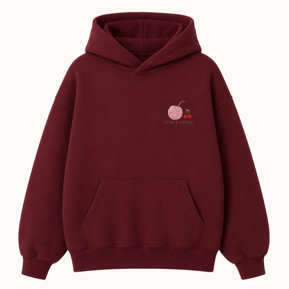 Model wearing the PinkyCoco Maroon Cherry Constellation oversized fleece hoodie