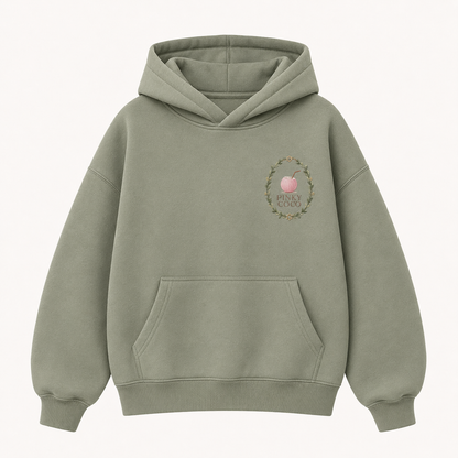 Model wearing the PinkyCoco Sage Bee Coconut Grove oversized fleece hoodie