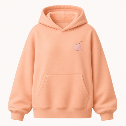 Model wearing the PinkyCoco Sun Kissed Blossom Beach oversized fleece hoodie