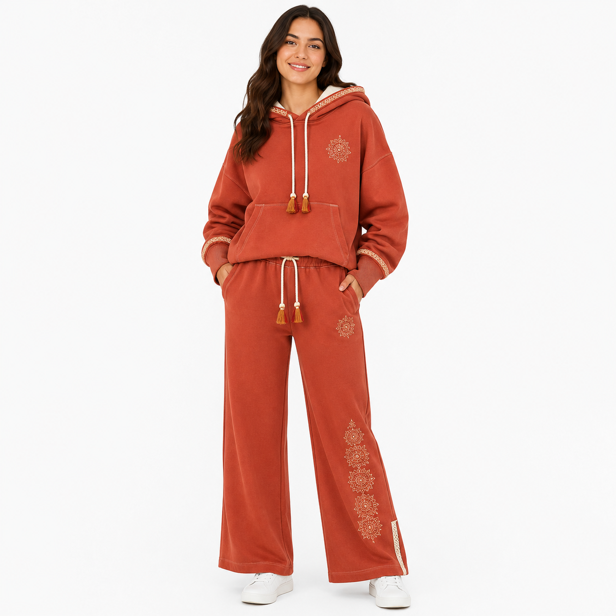 Model wearing the PinkyCoco Terracotta Mandala Dream fleece hoodie and sweatpants set, front view