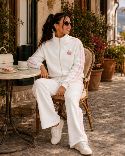 Model wearing the PinkyCoco White Pinkstripe Coco women's matching fleece lounge set, front view