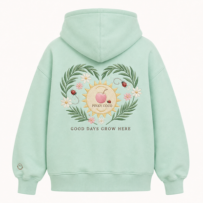 Front view of the PinkyCoco Mint Ladybug Palm Garden women's hoodie