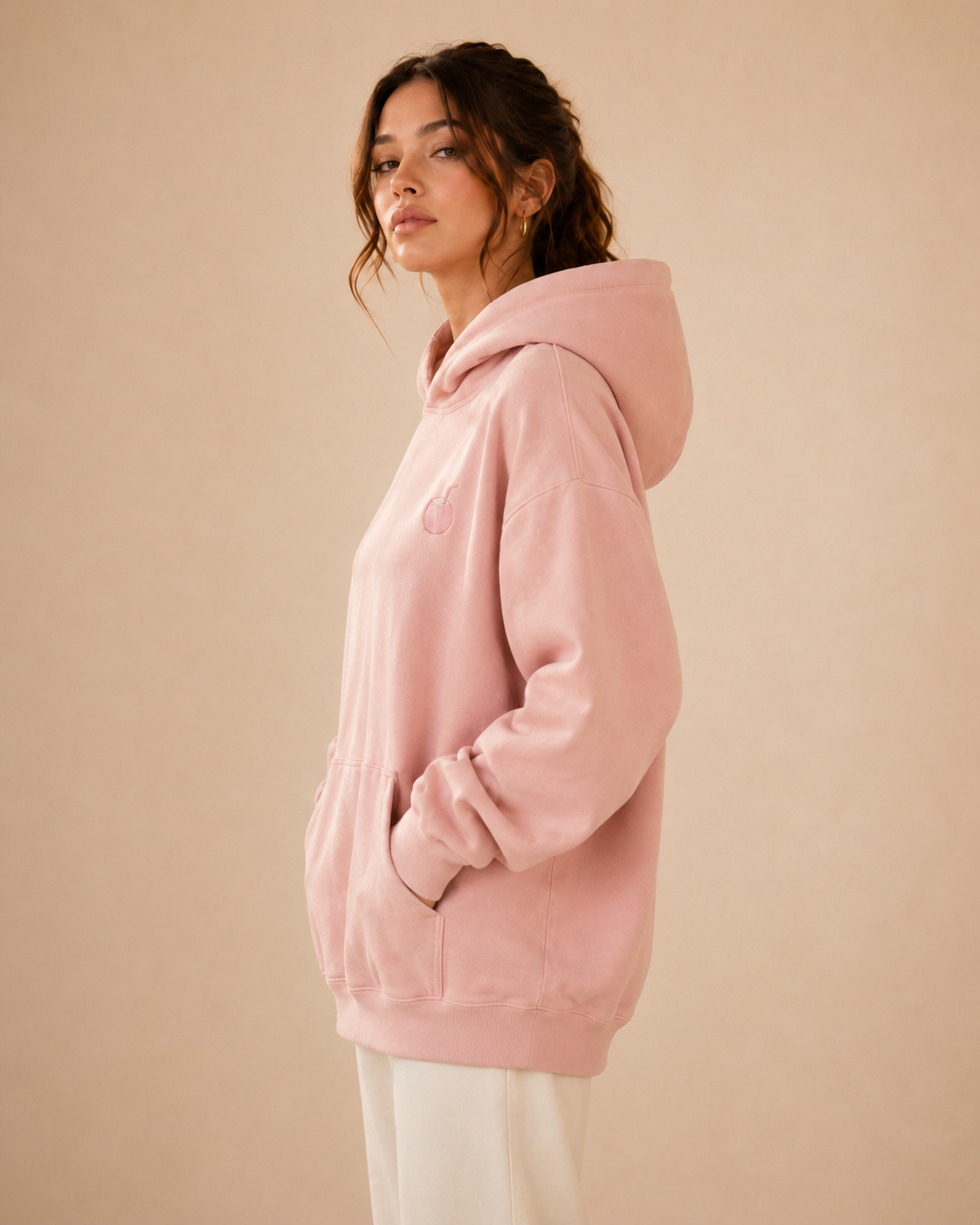 Three-quarter view of the PinkyCoco Blush Coco women's hoodie