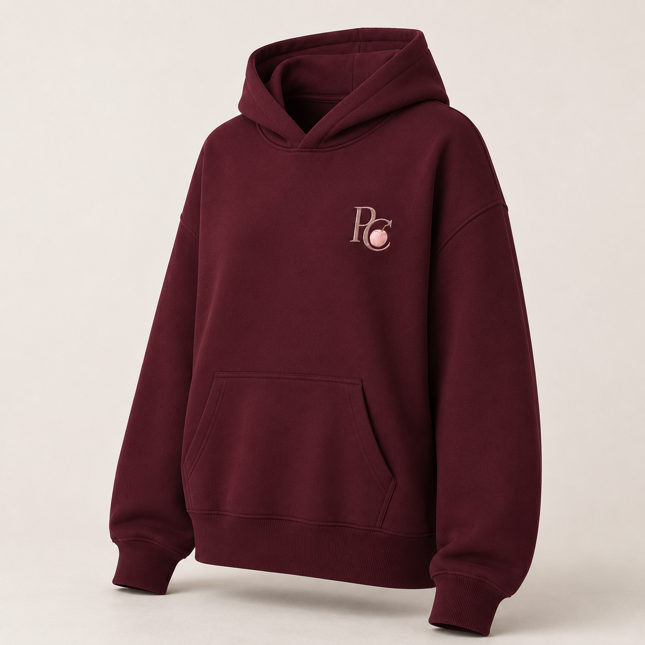 Three-quarter view of the PinkyCoco Burgundy Rose Moon women's hoodie