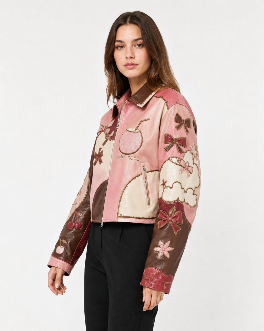 Model wearing PinkyCoco Coco Patchwork Art Women's Leather Fashion Jacket, three-quarter view