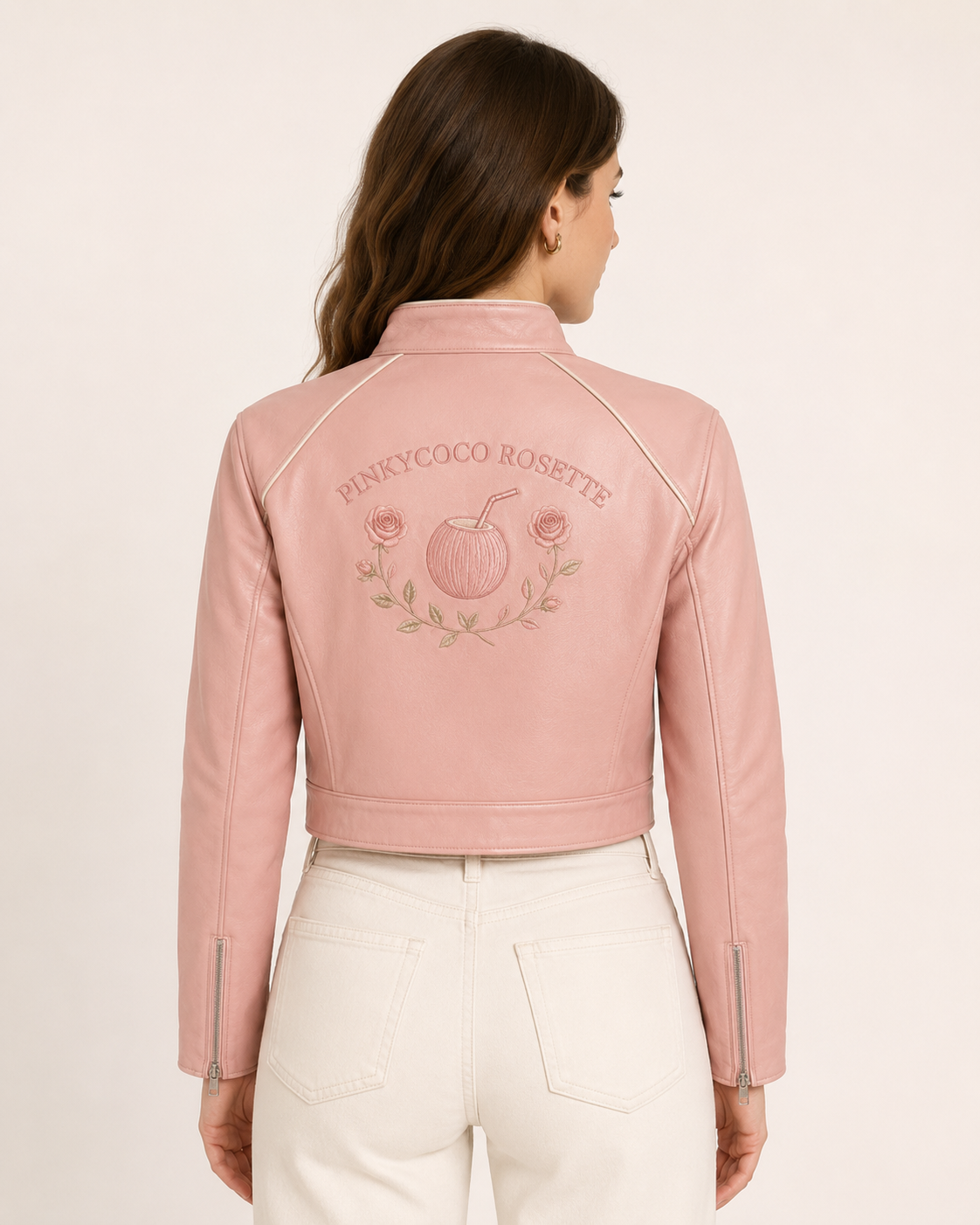 Model wearing PinkyCoco Coco Rosette Women's Leather Fashion Jacket, three-quarter view