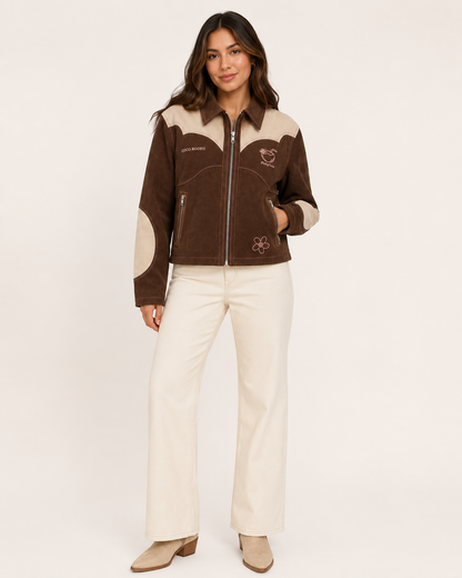 Model wearing PinkyCoco Cocoa Rodeo Women's Leather Fashion Jacket, three-quarter view