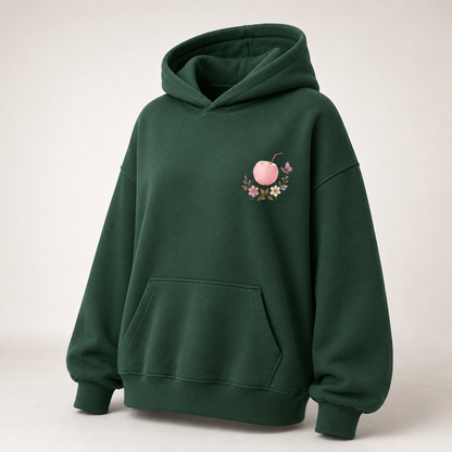 Three-quarter view of the PinkyCoco Emerald Wildflower Butterfly women's hoodie