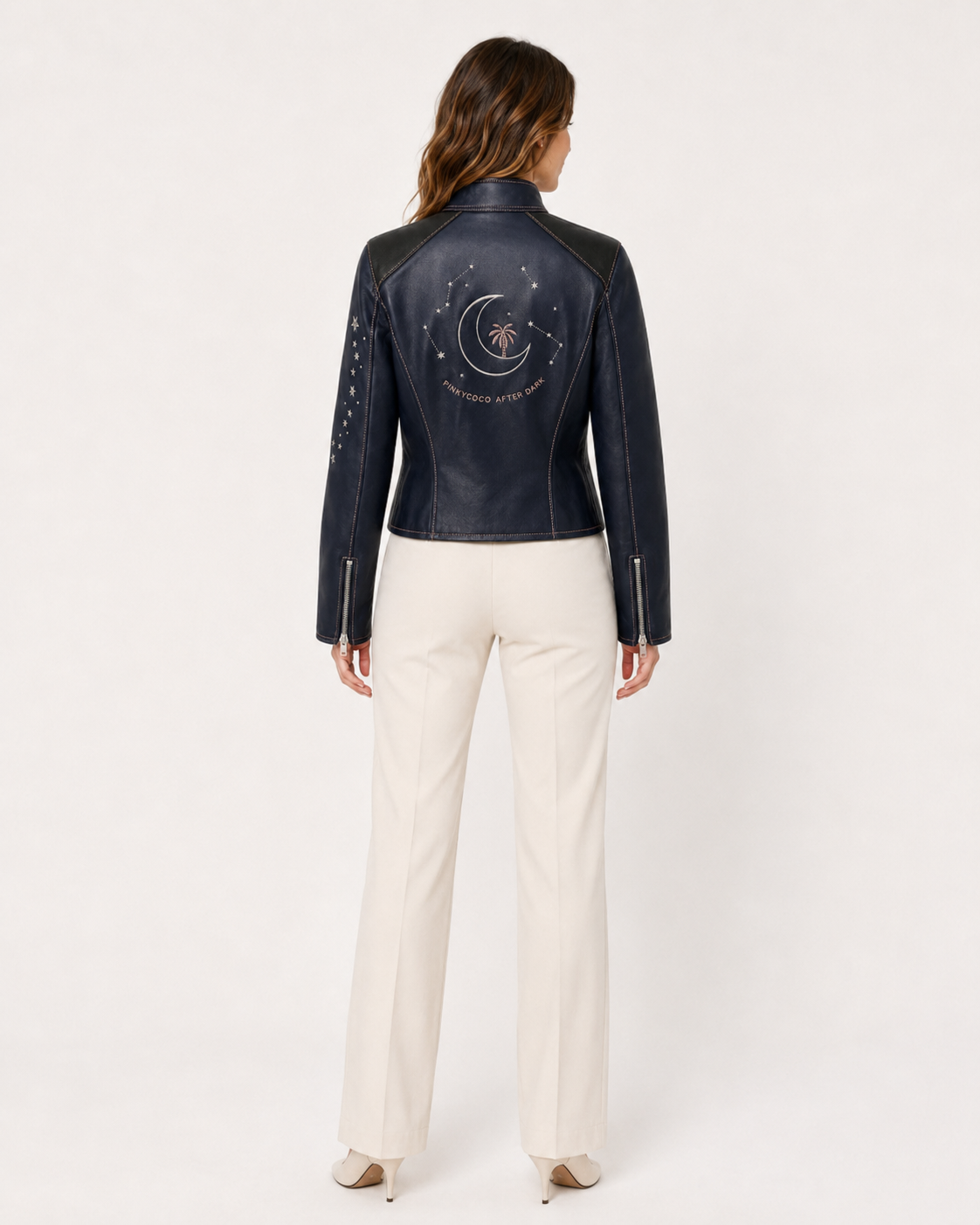Model wearing PinkyCoco Midnight Star Women's Leather Fashion Jacket, three-quarter view