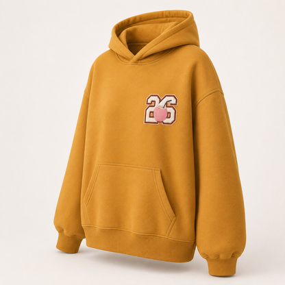 Three-quarter view of the PinkyCoco Mustard Retro Sun Society women's hoodie