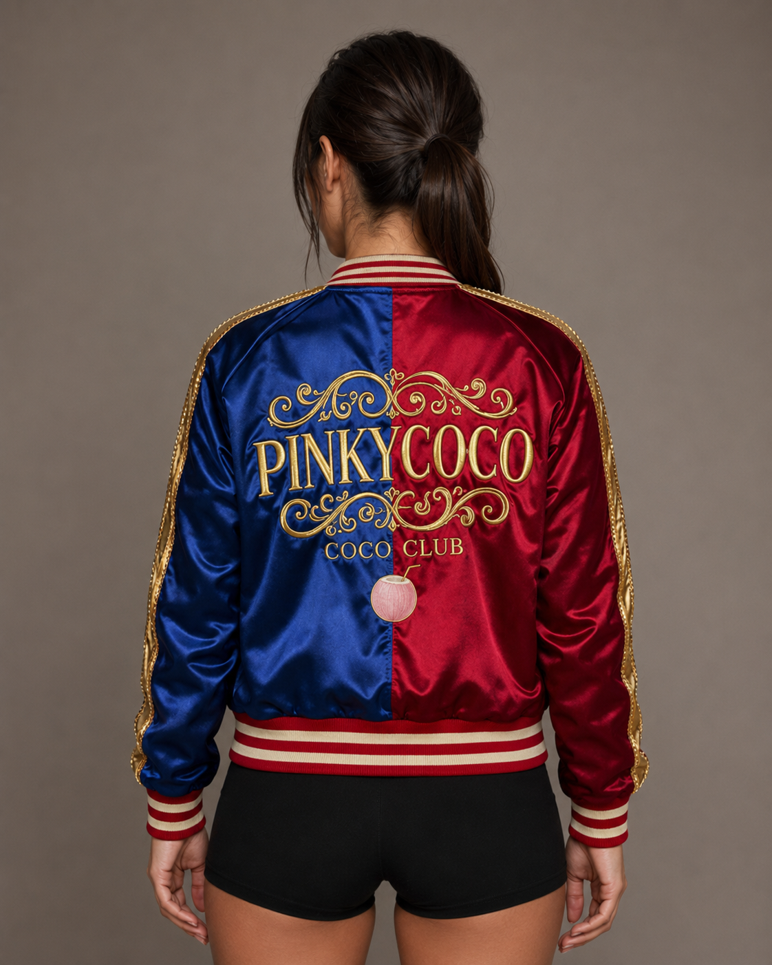Model wearing PinkyCoco Red Blue Coco Club Women's Satin Bomber Jacket, three-quarter view