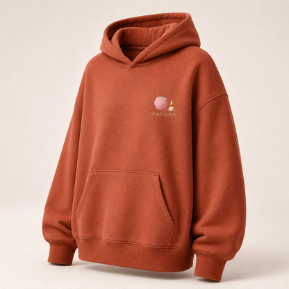 Three-quarter view of the PinkyCoco Terracotta Candle Sun Dunes women's hoodie