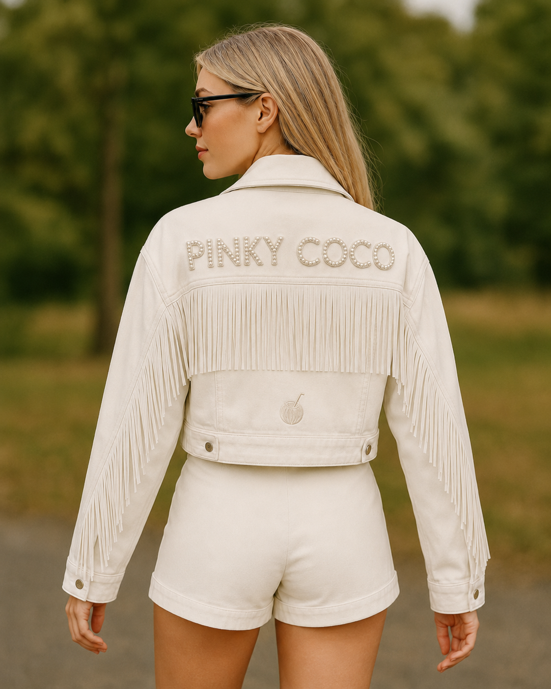 Model wearing PinkyCoco White Fringe Women's Denim Jacket, three-quarter view