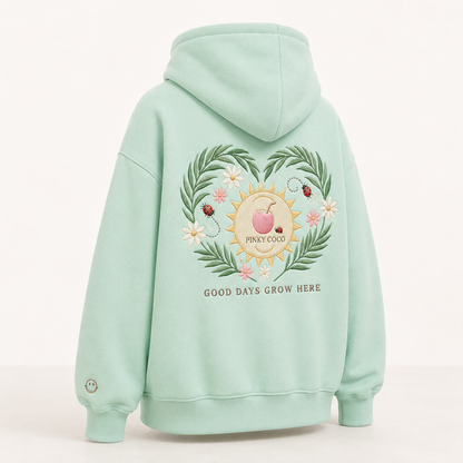 Back view of the PinkyCoco Mint Ladybug Palm Garden oversized fleece hoodie