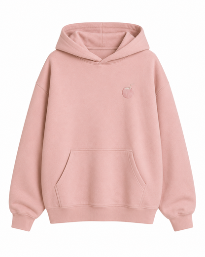 Model showing the back of the PinkyCoco Blush Coco hoodie