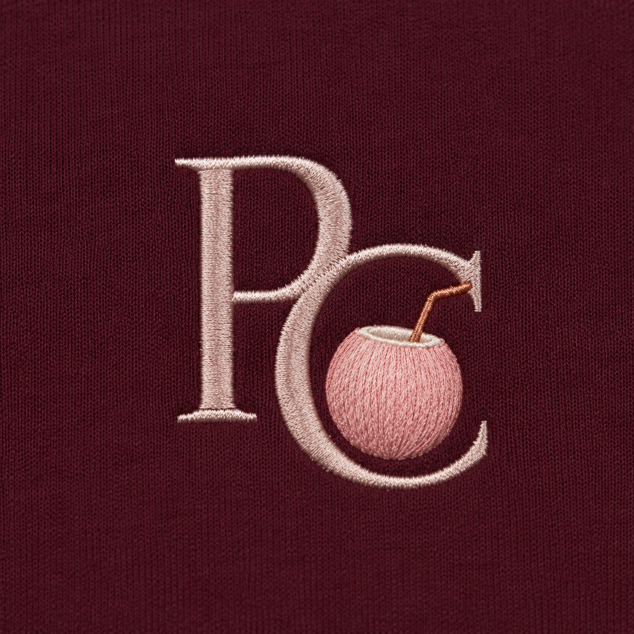 Model showing the back of the PinkyCoco Burgundy Rose Moon hoodie