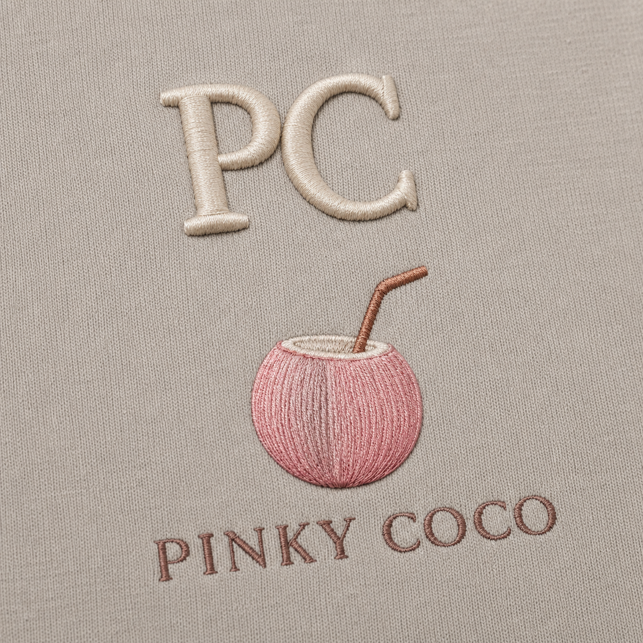 Model showing the back of the PinkyCoco Coastal Monogram Infinity hoodie