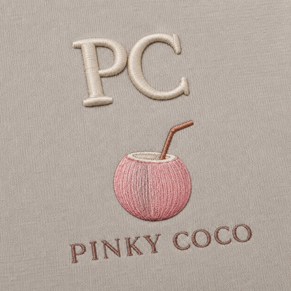 Model showing the back of the PinkyCoco Coastal Monogram Infinity hoodie