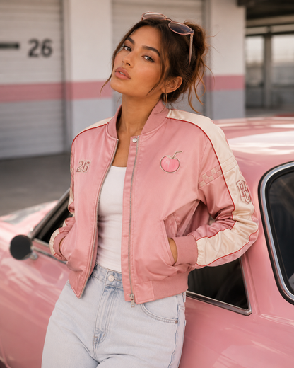 Model wearing the PinkyCoco Coco Speedway women's satin racing jacket, back view