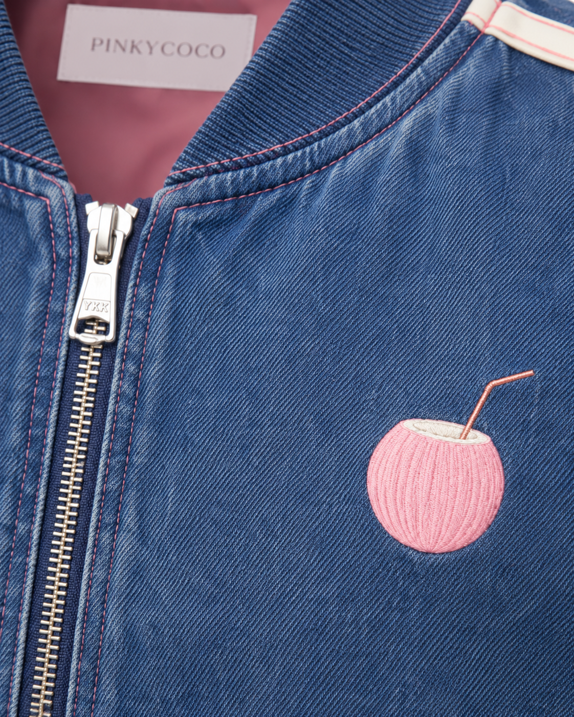 Model wearing the PinkyCoco Coco women's racing jacket, back view