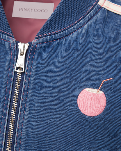 Model wearing the PinkyCoco Coco women's racing jacket, back view