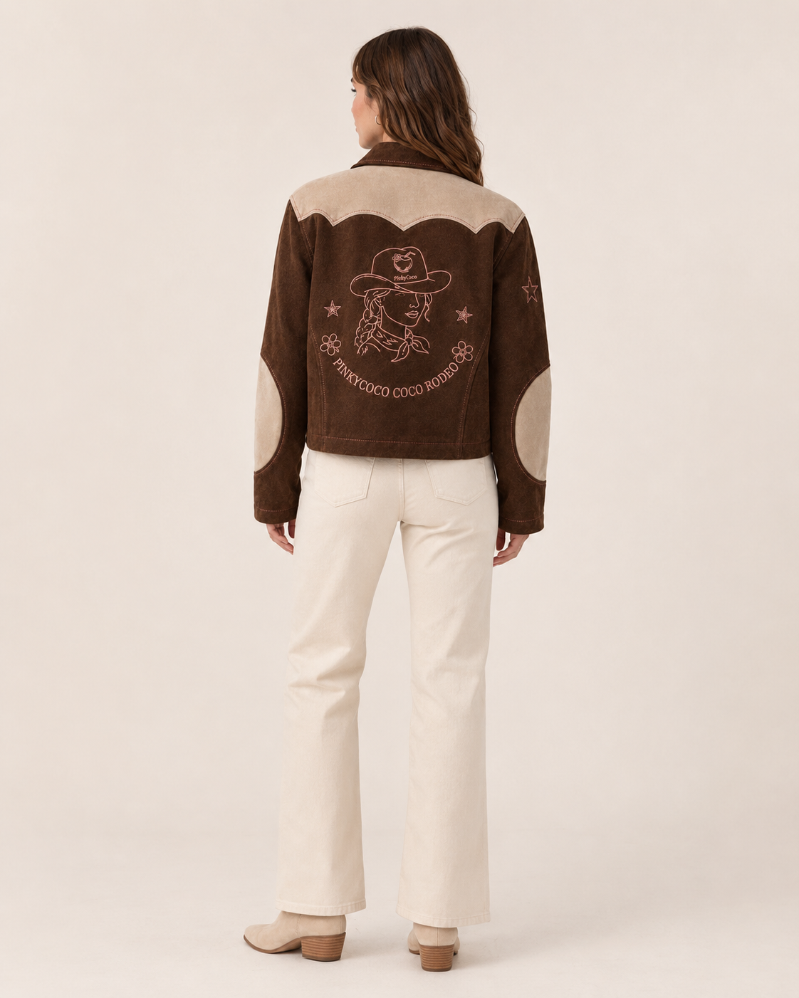 Model wearing PinkyCoco Cocoa Rodeo Women's Leather Fashion Jacket, back view