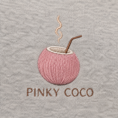 Model showing the back of the PinkyCoco Coffee By The Coast hoodie