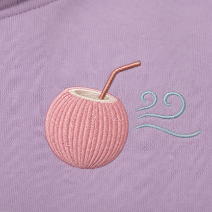 Model showing the back of the PinkyCoco Ocean Breeze hoodie