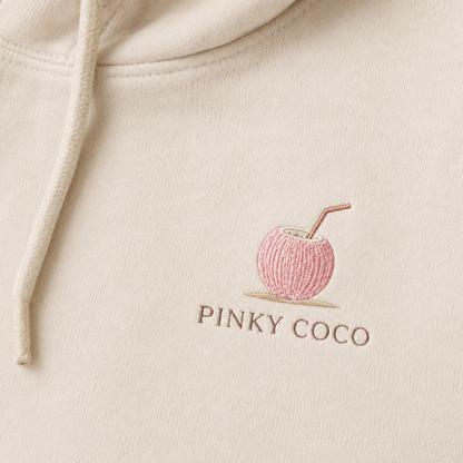 Model showing the back of the PinkyCoco Sand Sun And Coco hoodie