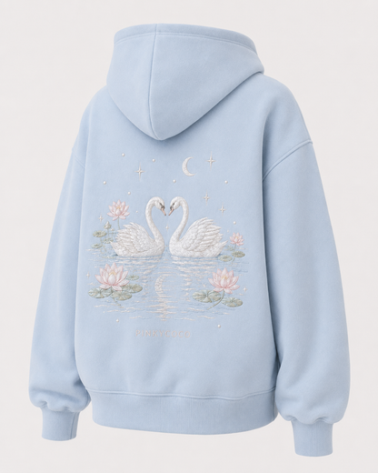 Model showing the back of the PinkyCoco Swan Lake hoodie