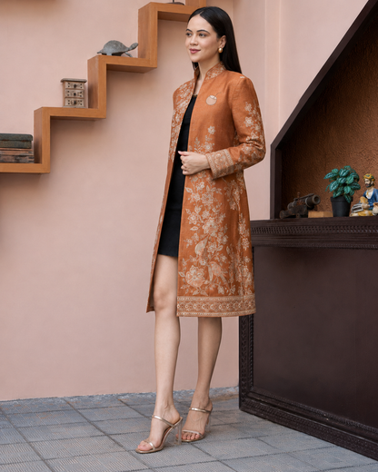 Model wearing PinkyCoco Terracotta Floral Women's Statement Coat, back view