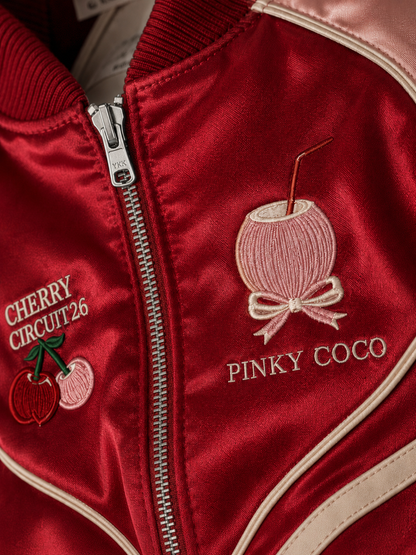Close-up of the PinkyCoco Cherry Circuit women's satin racing artwork