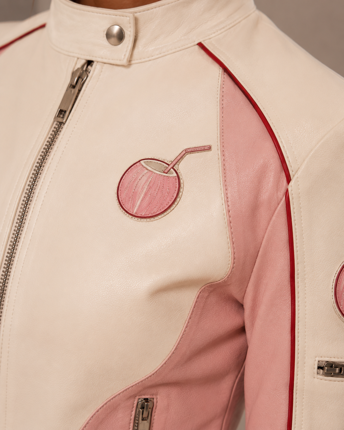 Sheepskin leather construction detail on the PinkyCoco Blush women's racing jacket and skirt set