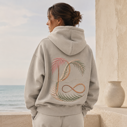 Detail of the hood, cuffs and stitching on the PinkyCoco Coastal Monogram Infinity hoodie