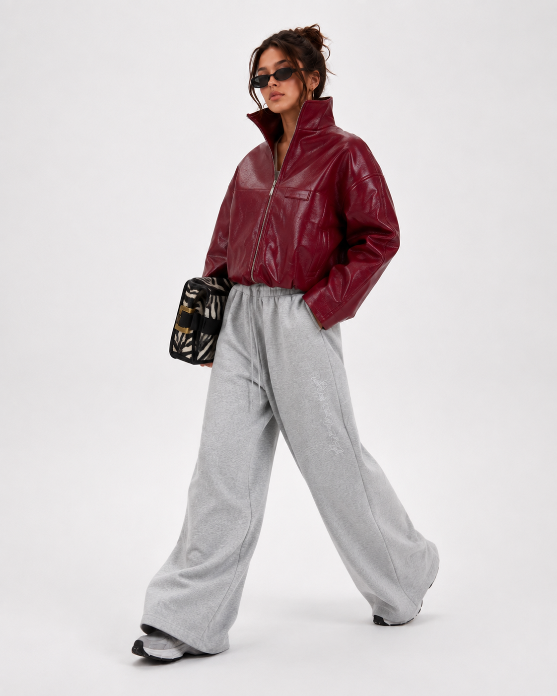 PinkyCoco Cherry Noir burgundy leather jacket walking lifestyle view