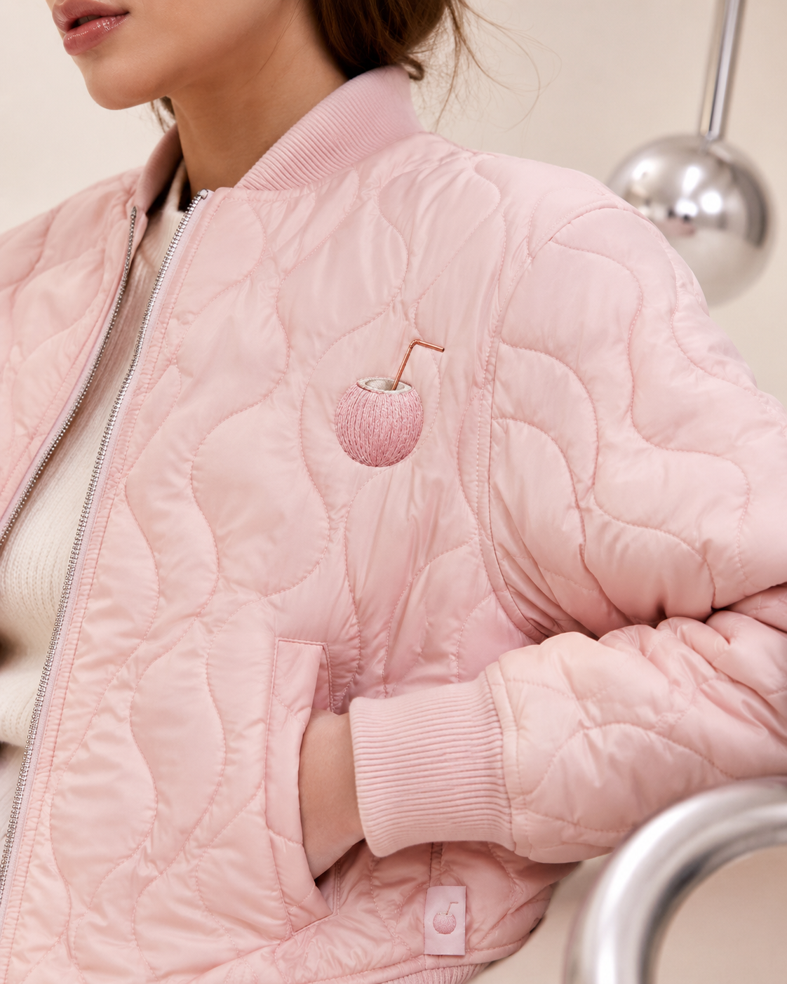 Close-up of PinkyCoco jacket embroidery and construction