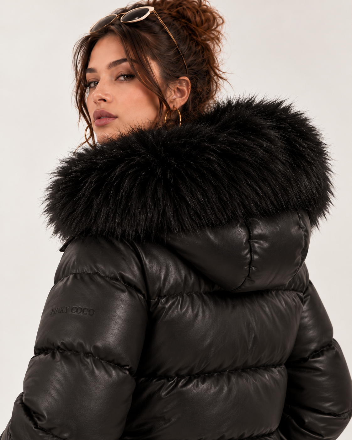 PinkyCoco Noir Luxe black puffer jacket rear three-quarter view